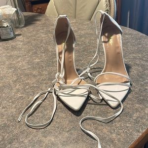 Elegant heeled sandals in as new condition